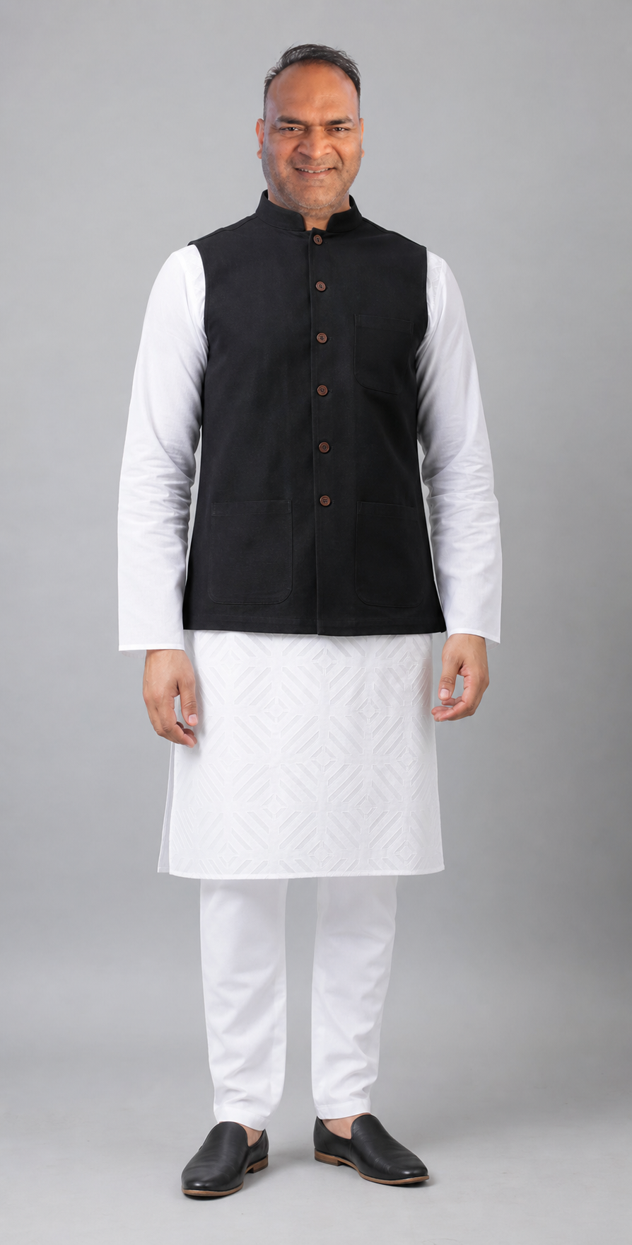 Portrait of Hitendra Kumar in kurta and jacket